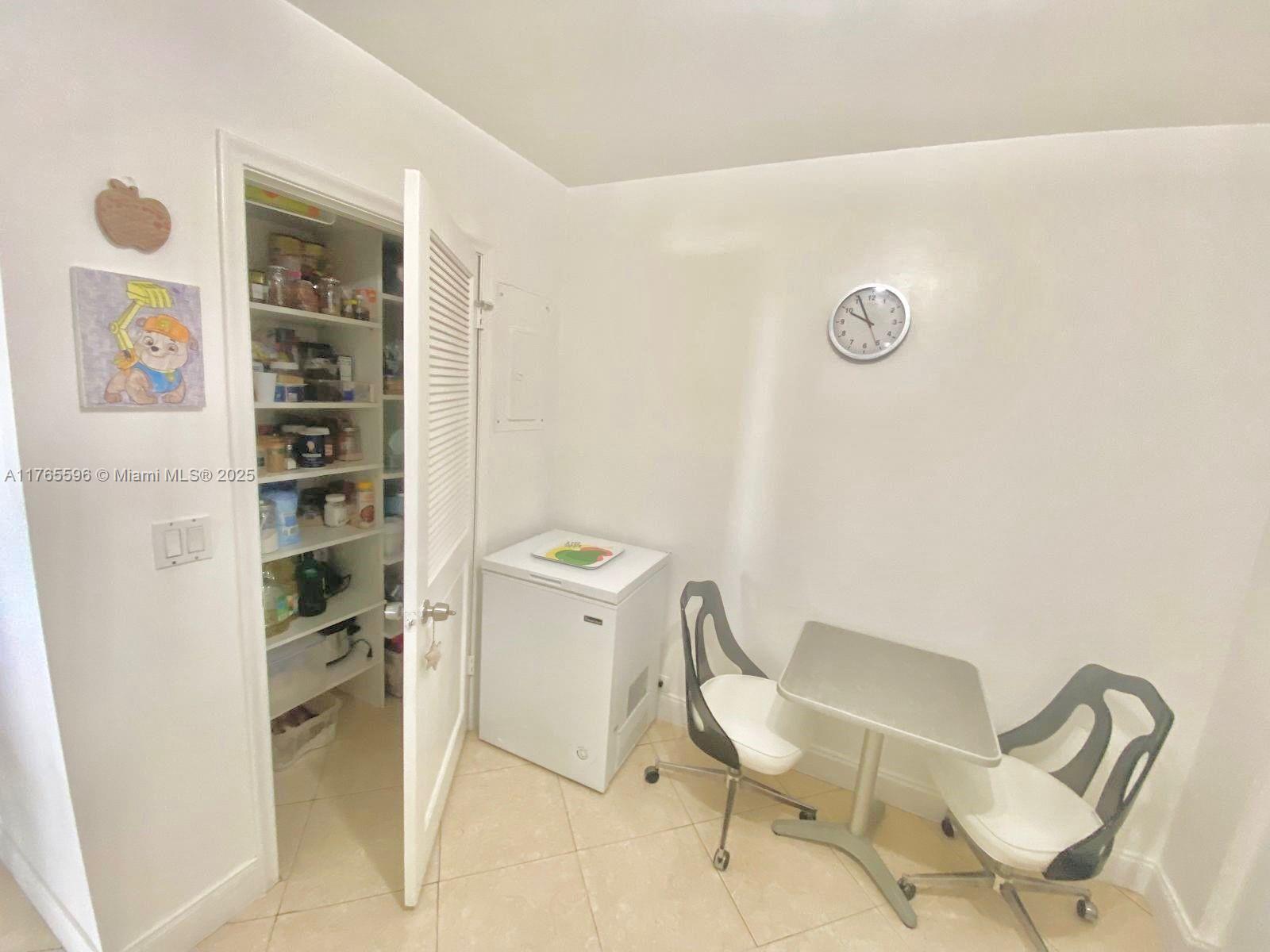 9801 Collins Avenue, Unit 8M Bal Harbour, FL 33154 - Photo 26 of 29 a view of a hallway with seating area