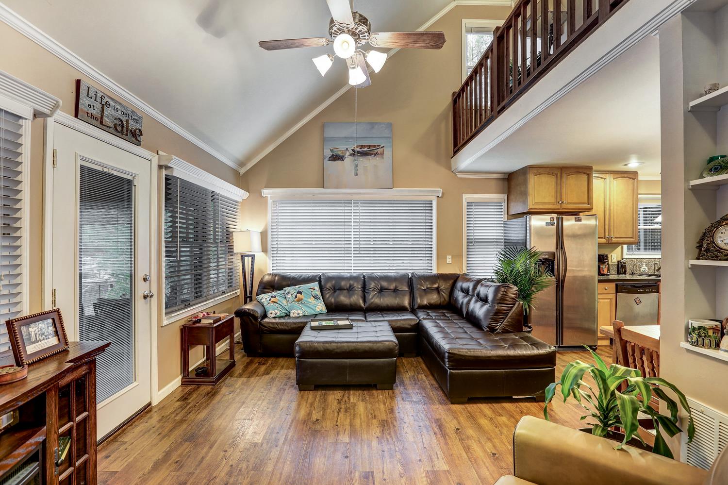 1595 Lake Logan Road Ardmore, TN 38449 - Photo 9 of 21 a living room with furniture and wooden floor