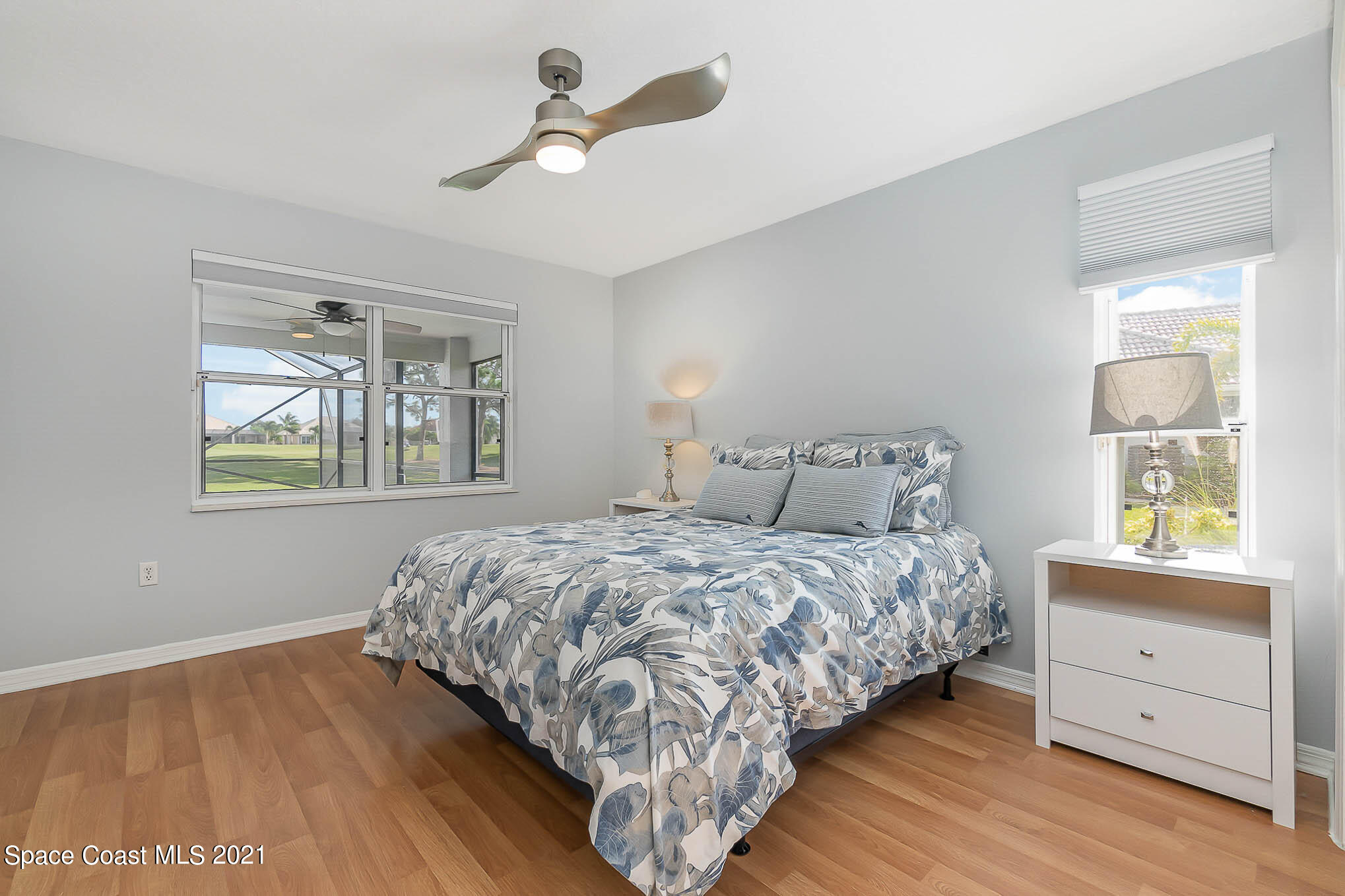 689 Spring Lake Drive Melbourne, FL 32940 - Photo 27 of 49 a bedroom with a bed and a window
