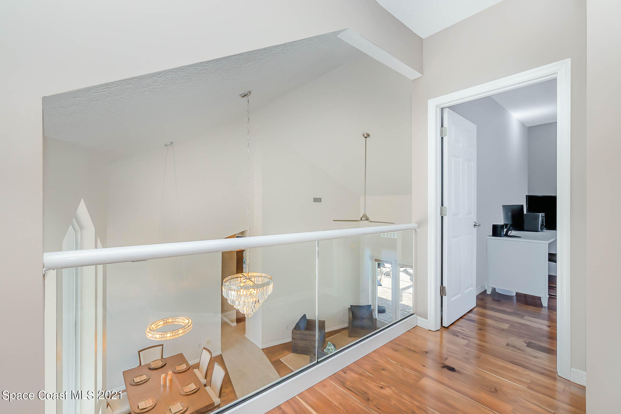 689 Spring Lake Drive Melbourne, FL 32940 - Photo 35 of 49 a view of living room and front door