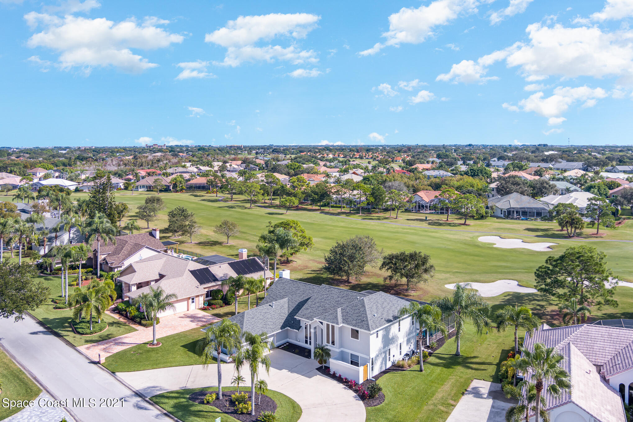 689 Spring Lake Drive Melbourne, FL 32940 - Photo 5 of 49 an aerial view of residential houses with outdoor space