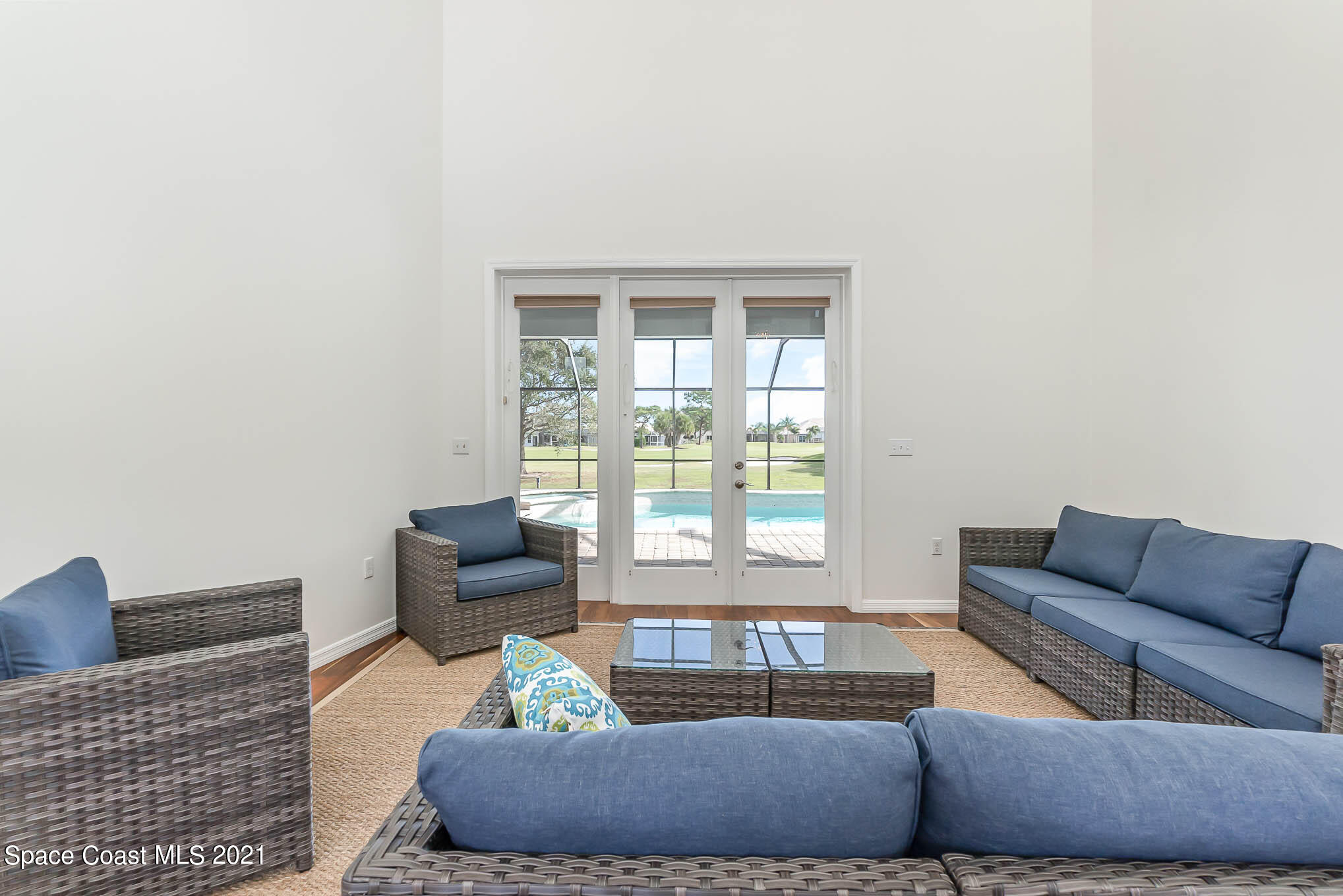 689 Spring Lake Drive Melbourne, FL 32940 - Photo 8 of 49 a living room with furniture and a window