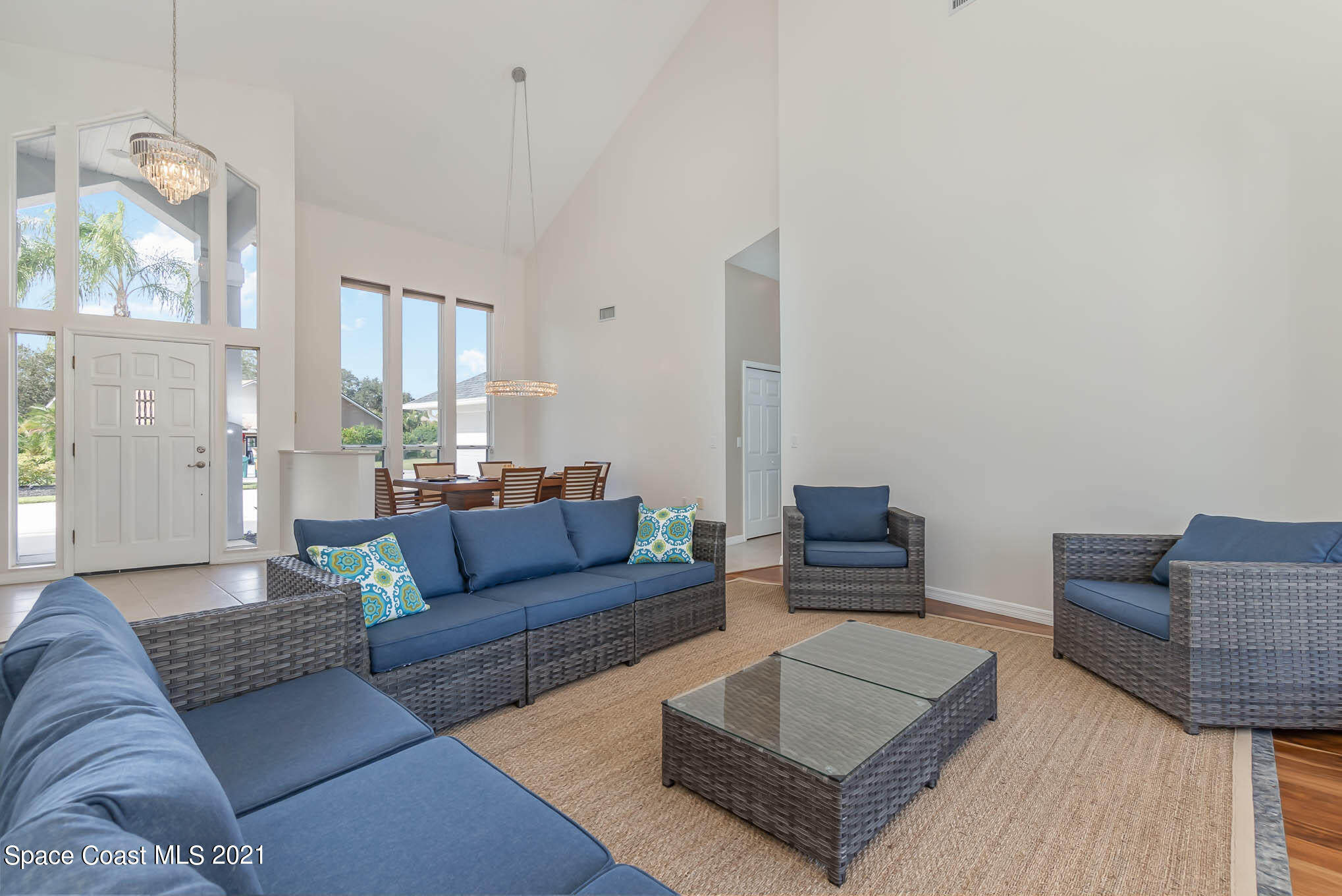 689 Spring Lake Drive Melbourne, FL 32940 - Photo 9 of 49 a living room with furniture and wooden floor