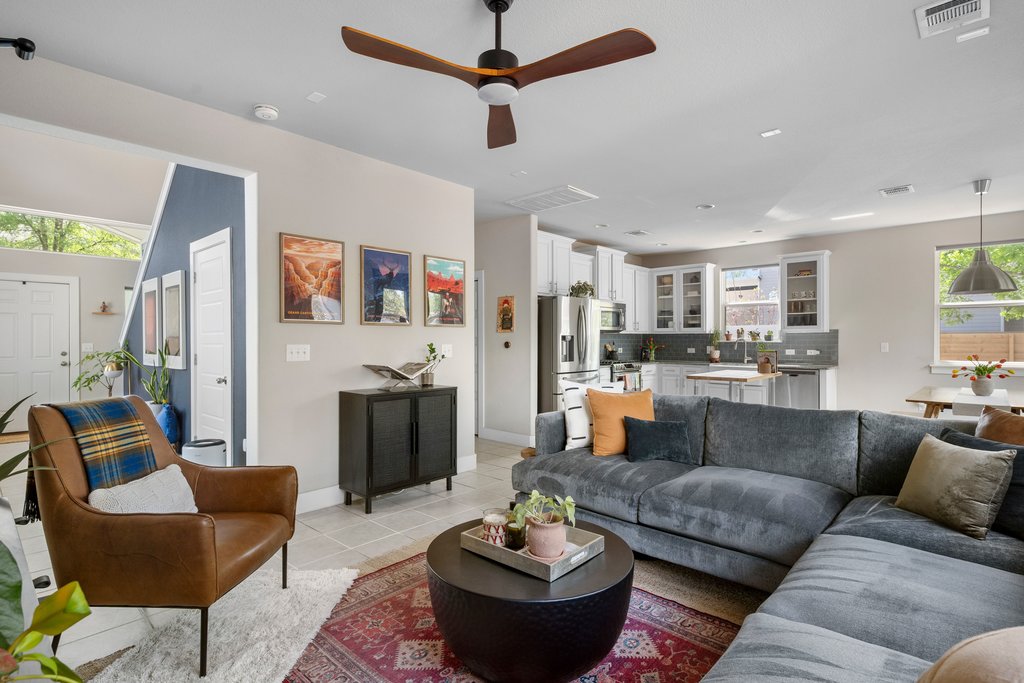 610 Bernstein Street, Unit 14 Austin, TX 78745 - Photo 6 of 39 Living room featuring a ceiling fan and light tile patterned flooring