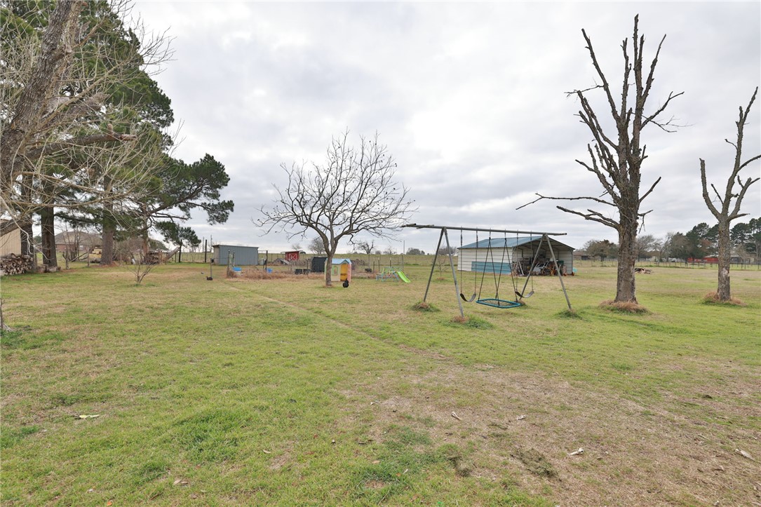 7474 Welch Road Bryan, TX 77808 - Photo 16 of 27 a view of yard with tree s