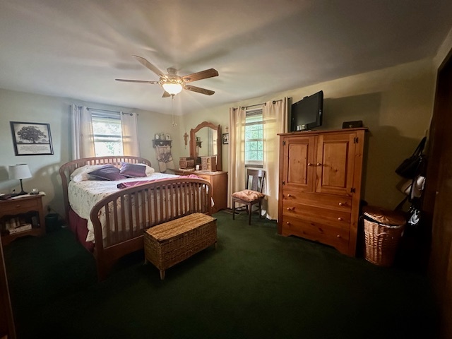 1364 West Tower Road Kankakee, IL 60901 - Photo 13 of 18 a bedroom with a bed chair and window