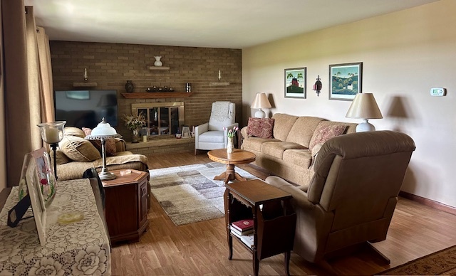 1364 West Tower Road Kankakee, IL 60901 - Photo 5 of 18 a living room with furniture and a fireplace