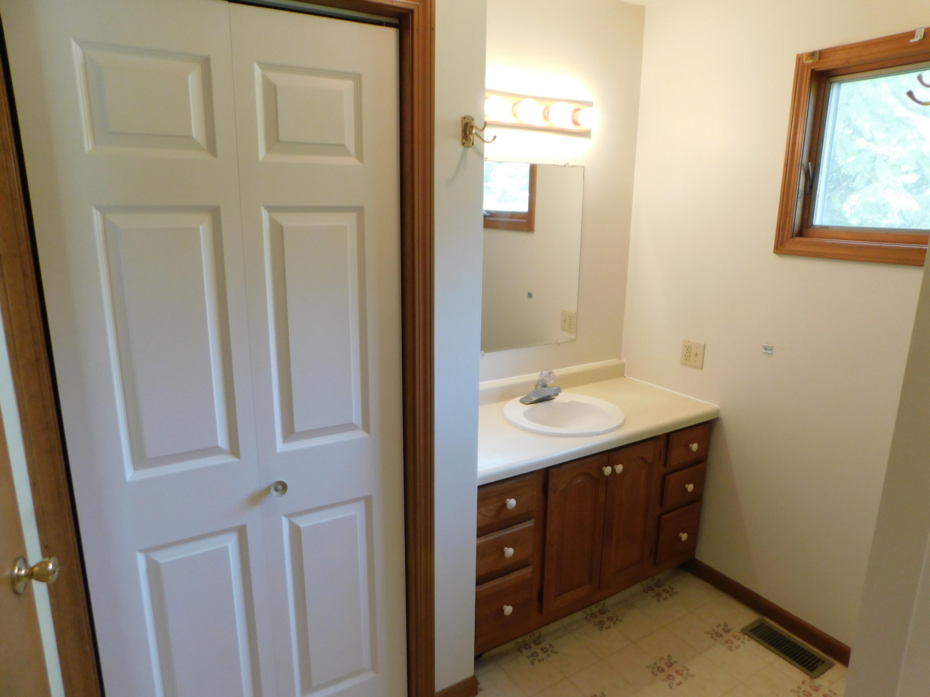 109 East South Street Decatur, MI 49045 - Photo 11 of 18 full bathroom with linen closet