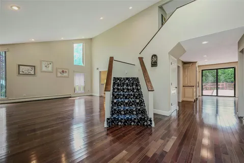 a view of entryway with wooden floor