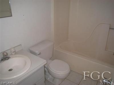 17440 Kentucky Road Fort Myers, FL 33967 - Photo 5 of 6 a bathroom with a sink and a toilet