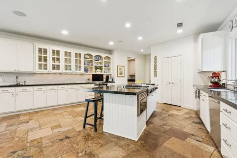 a dinning area with furniture and window
