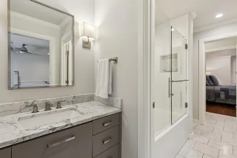 a bed room with a bed and a window