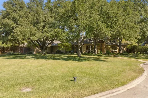 a view of swimming pool with outdoor seating