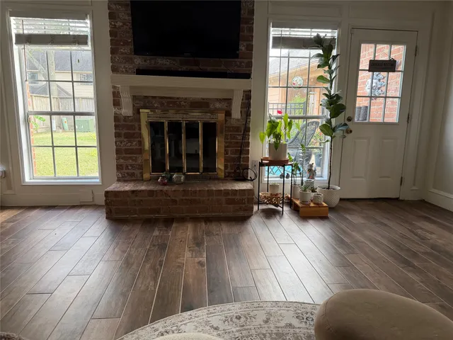 a kitchen with stainless steel appliances granite countertop a stove a sink dishwasher and a refrigerator