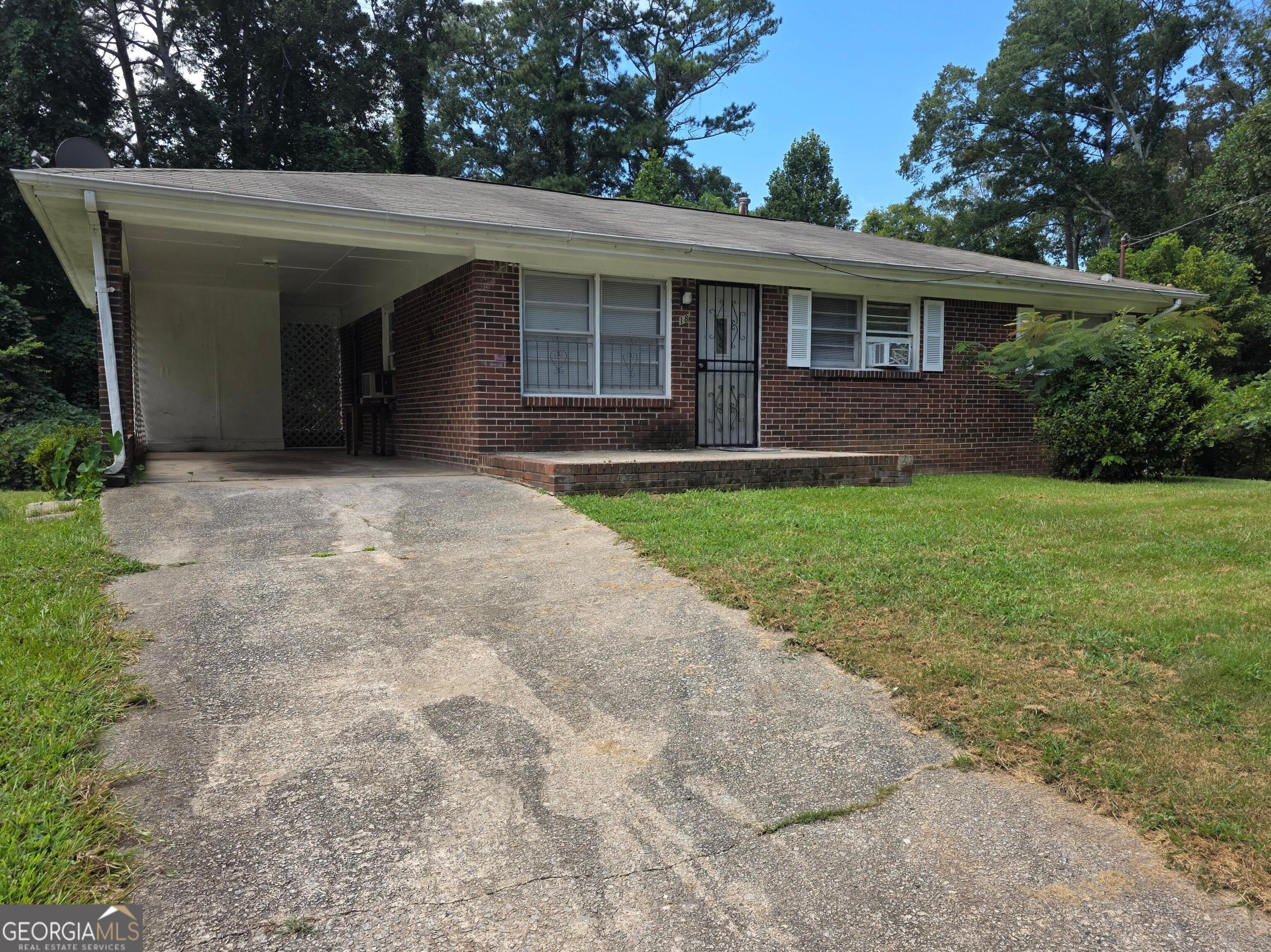 187 Brownlee Road Southwest Atlanta, GA 30331 - Photo 1 of 1 a view of a house with a yard