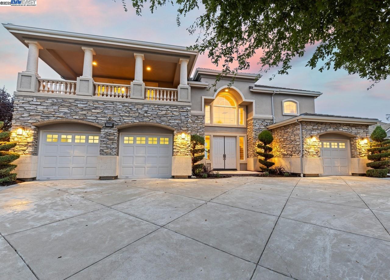 3394 Ashbourne Circle San Ramon, CA 94583 - Photo 1 of 1 a view of a building with a fountain and a car parked in front of it