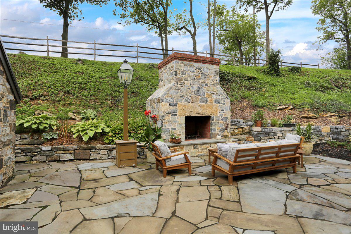 208 Spangsville Road Oley, PA 19547 - Photo 20 of 61 Patio with Fireplace