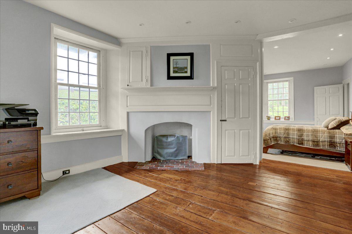 208 Spangsville Road Oley, PA 19547 - Photo 30 of 61 Sitting Area with Fireplace