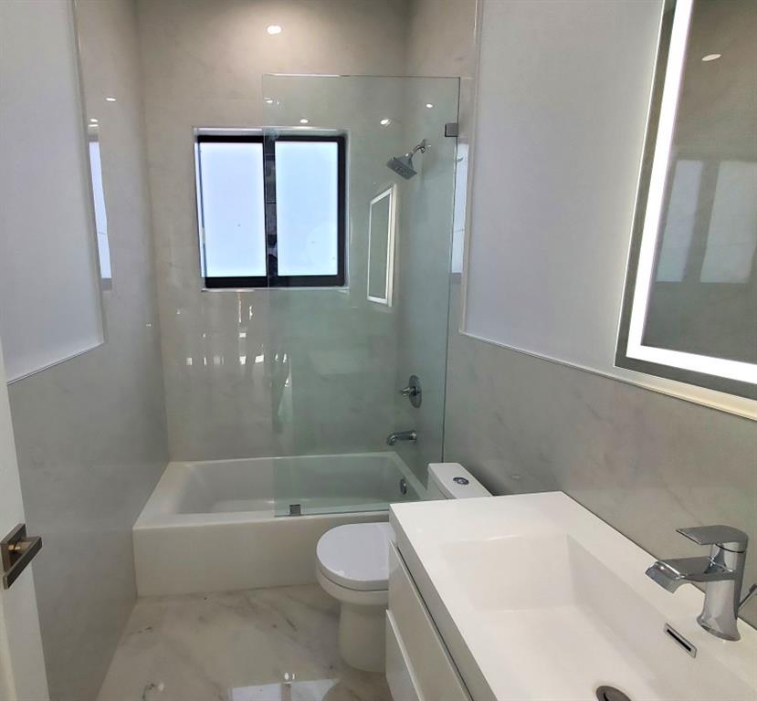 11000 Southwest 30th Court Fort Lauderdale, FL 33328 - Photo 35 of 44 a bathroom with a sink a toilet and shower