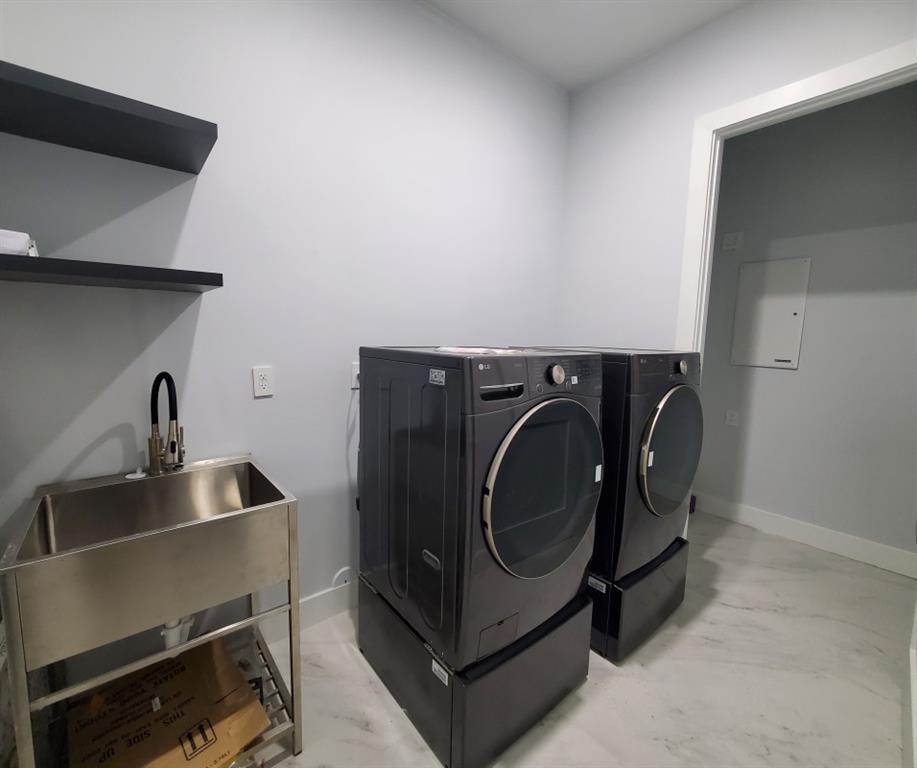 11000 Southwest 30th Court Fort Lauderdale, FL 33328 - Photo 41 of 44 a utility room with dryer and washer