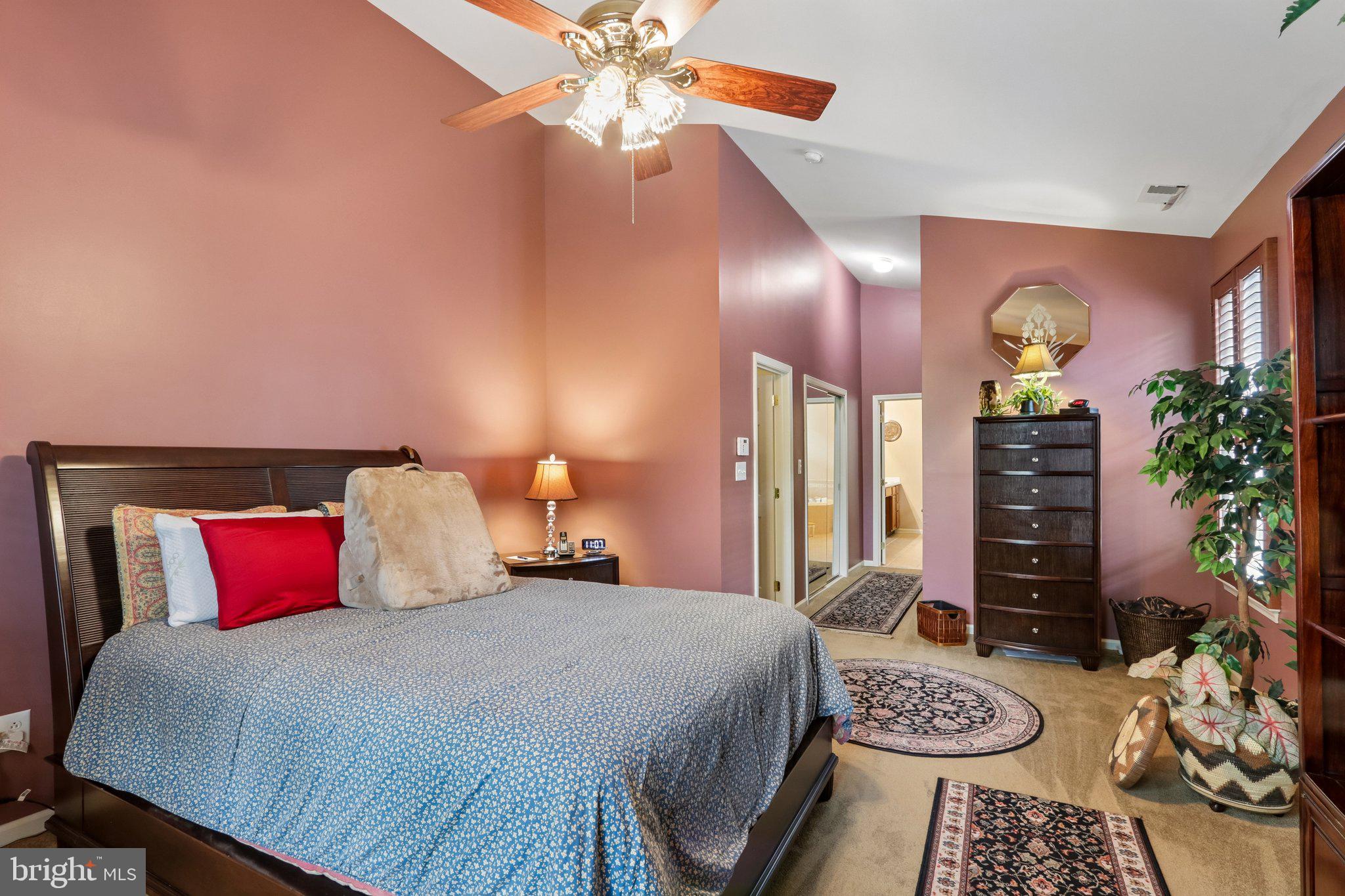 39 Danbury Road Swedesboro, NJ 08085 - Photo 25 of 62 a bedroom with a bed and wooden floor