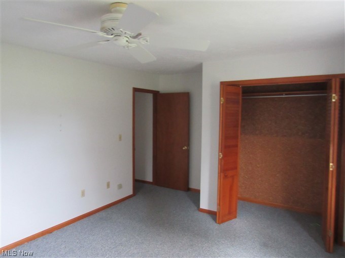 2189 Sentinel Road Dorset, OH 44032 - Photo 20 of 28 Carpeted bedroom with ceiling fan