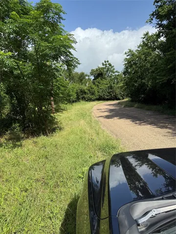 a view of a two chairs in the balcony
