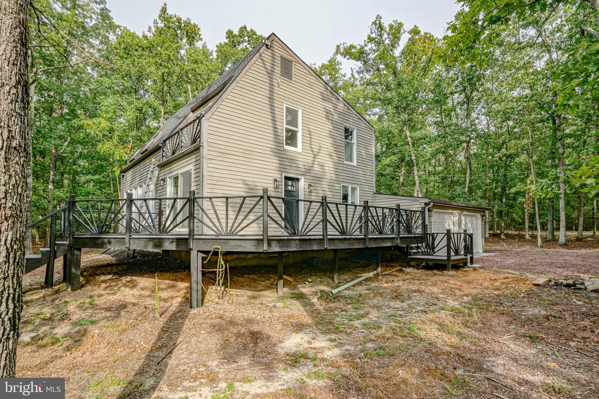 965 Martha Boulevard Atco, NJ 08004 - Photo 3 of 70 a view of a house with wooden deck front of house