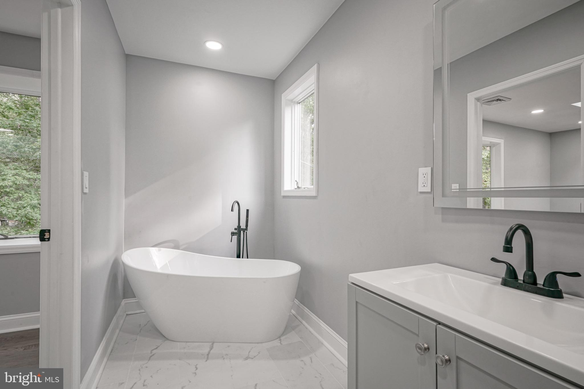 965 Martha Boulevard Atco, NJ 08004 - Photo 8 of 70 a bathroom with a sink and a bathtub