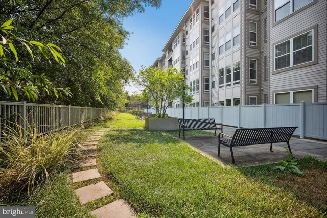 a view of backyard with green space