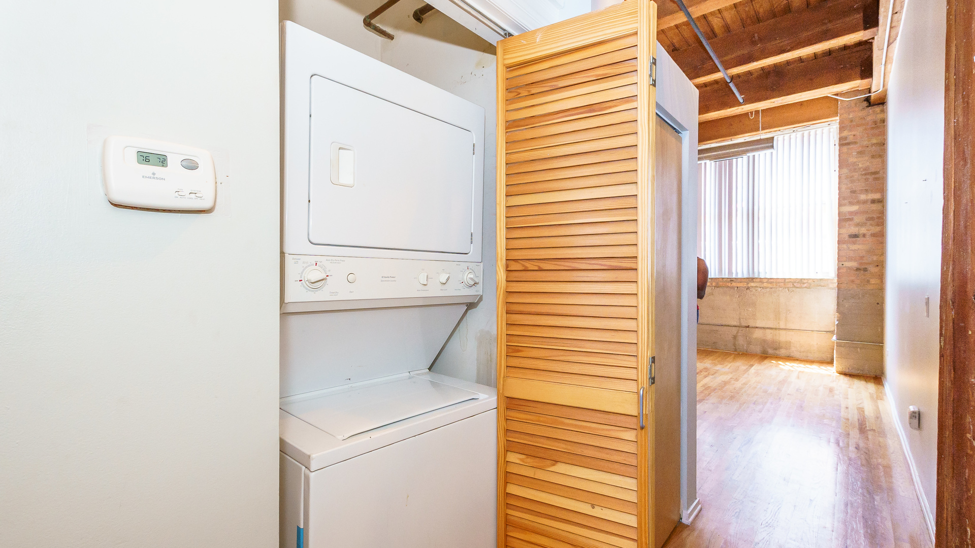 1500 West Monroe Street, Unit 113 Chicago, IL 60607 - Photo 13 of 15 a view of washer and dryer