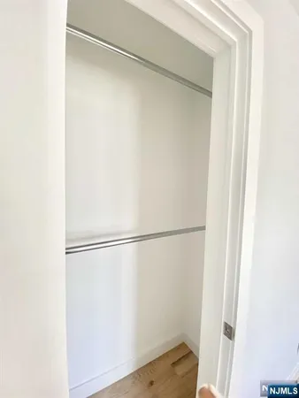 a view of small space with wooden floor