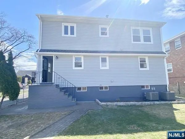 a view of backyard of a house