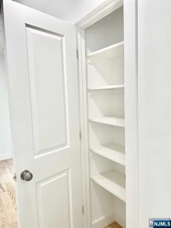 a view of a room with rack on the wall