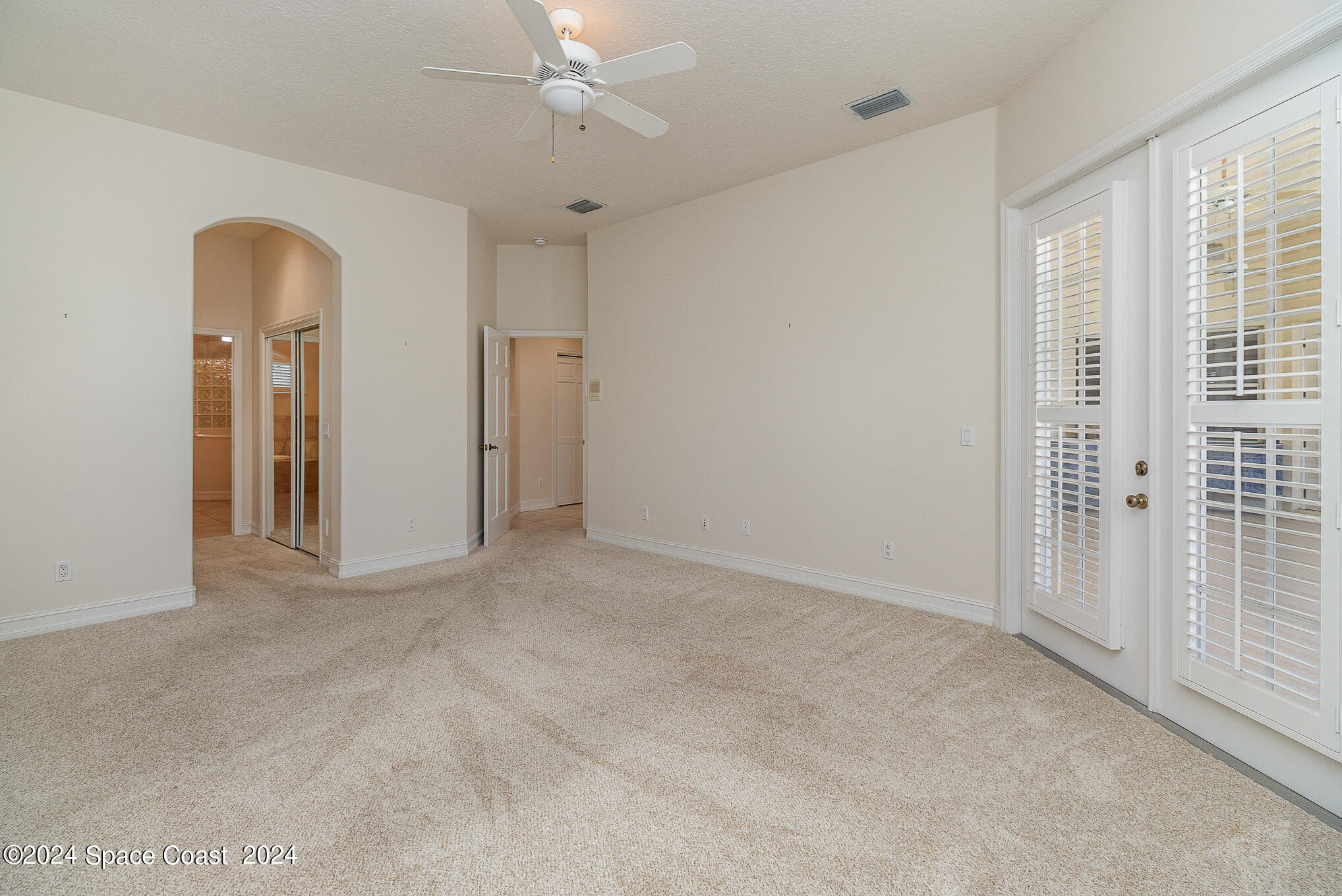 465 Baytree Drive Melbourne, FL 32940 - Photo 19 of 36 a view of an empty room with a window