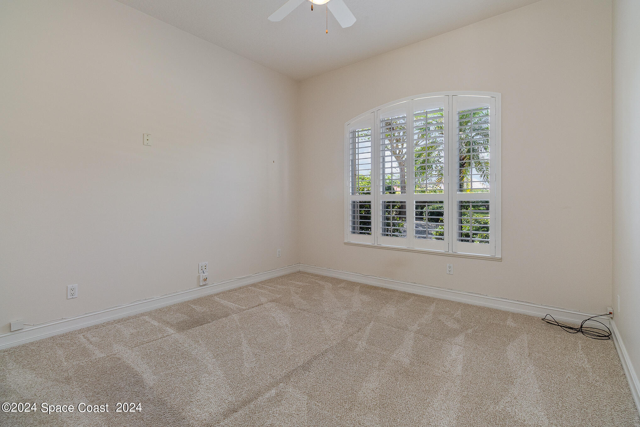 465 Baytree Drive Melbourne, FL 32940 - Photo 24 of 36 an empty room with a window