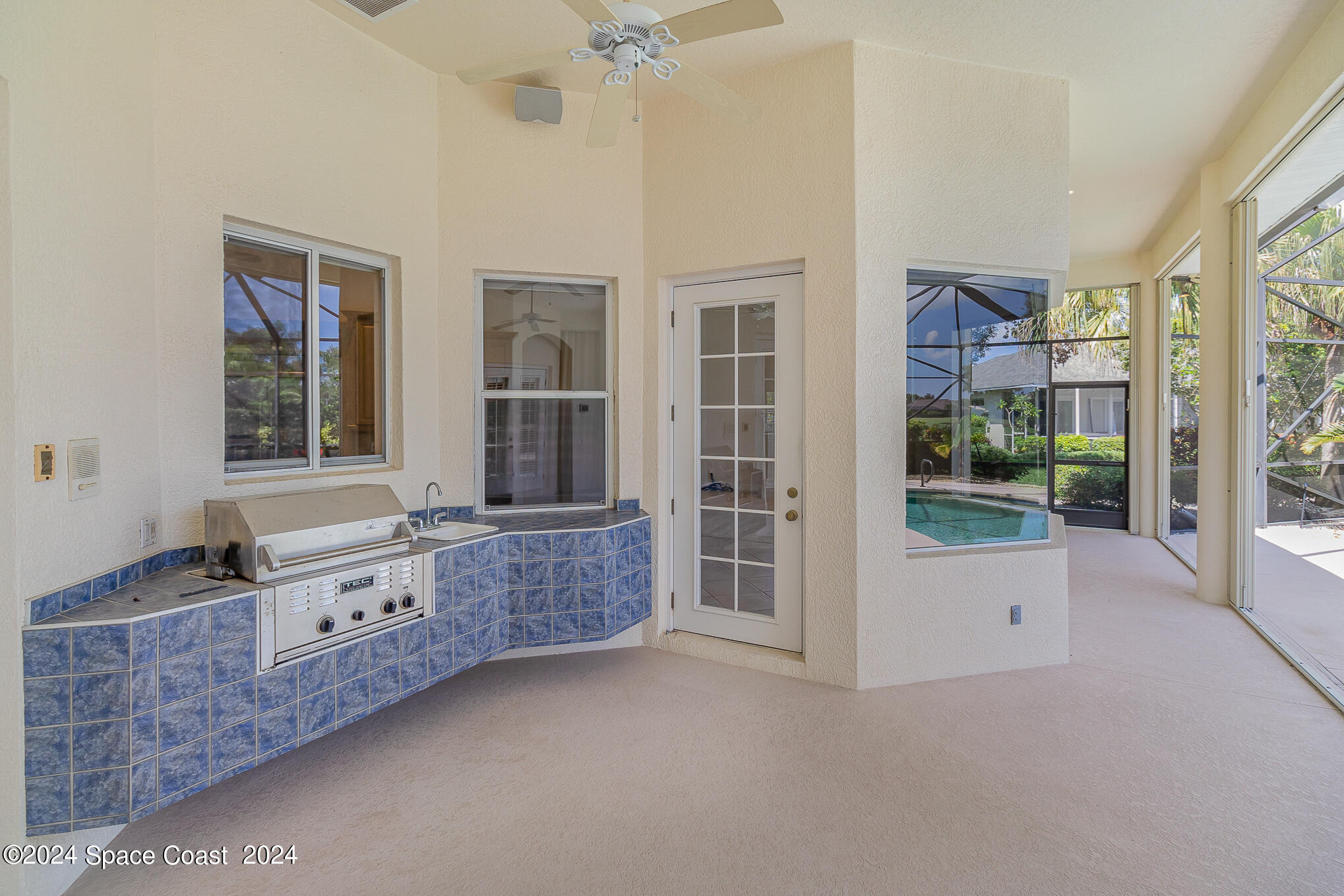 465 Baytree Drive Melbourne, FL 32940 - Photo 27 of 36 a spacious bathroom with a granite countertop tub sink and mirror