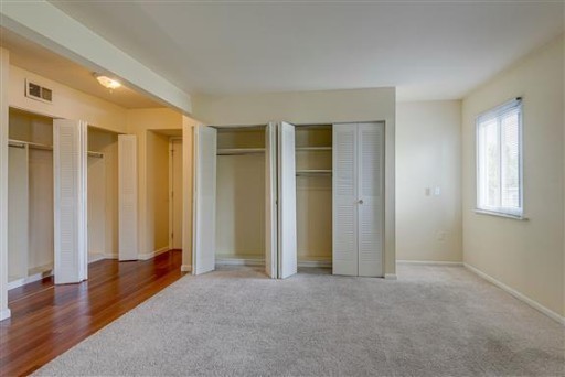 1900 Richard Jones Road, Unit V2 Nashville, TN 37215 - Photo 15 of 23 an empty room with windows and closet