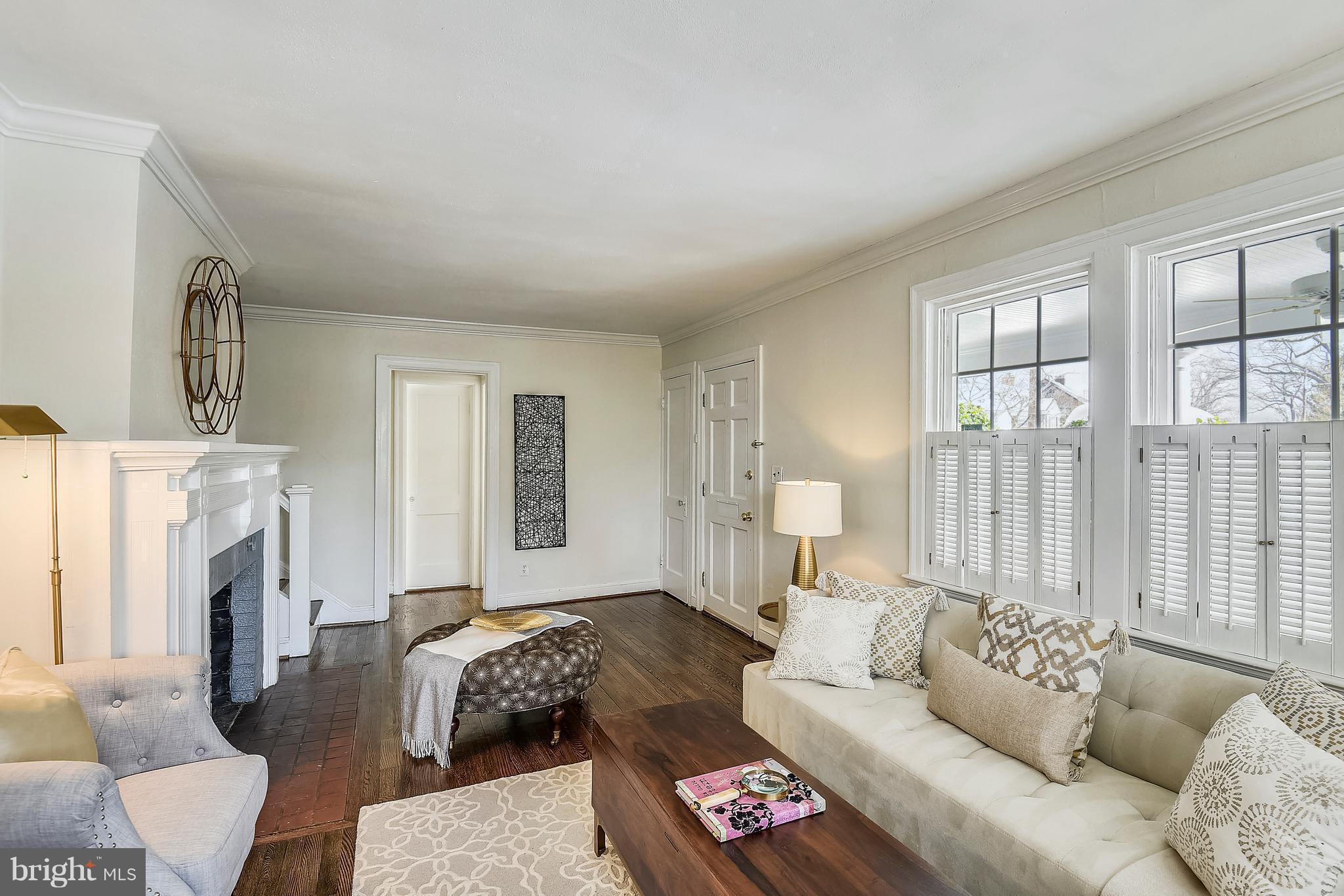 2400 Cameron Mills Road Alexandria, VA 22302 - Photo 6 of 48 Living room with wood burning fireplace