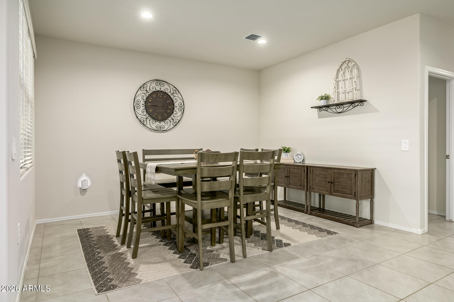 9471 Greenhouse Road Florence, AZ 85132 - Photo 7 of 22 an old fashioned kitchen with a table and chairs
