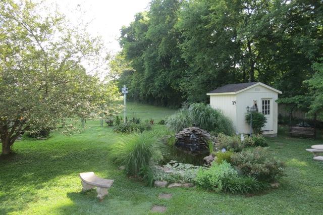 4623 Adams Road Hixson, TN 37343 - Photo 24 of 32 Fish pond & Out Building
