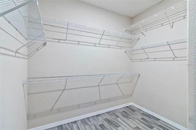 a view of a room with racks on the wall