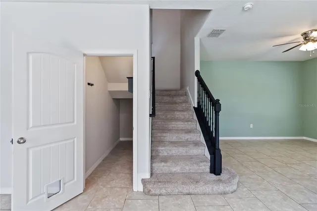 a view of an entryway with staircase