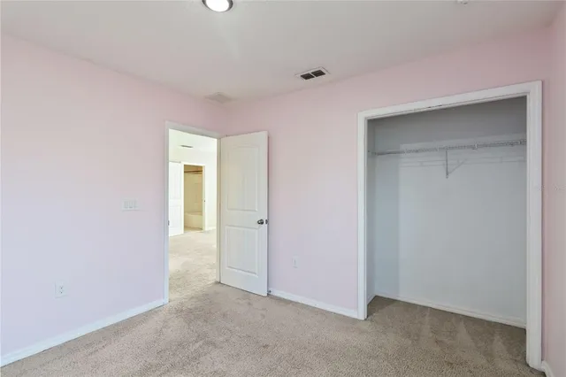 an empty room with closet