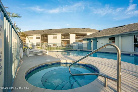 a view of a house with swimming pool