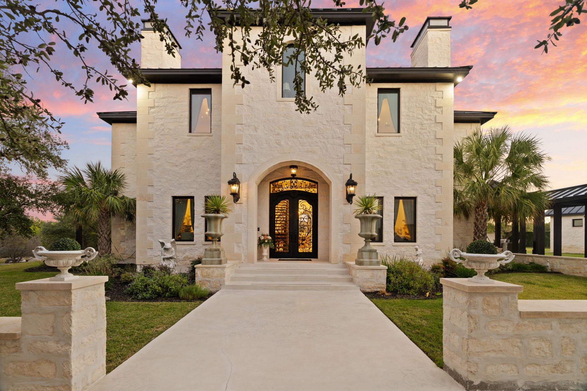 a front view of a house with a yard