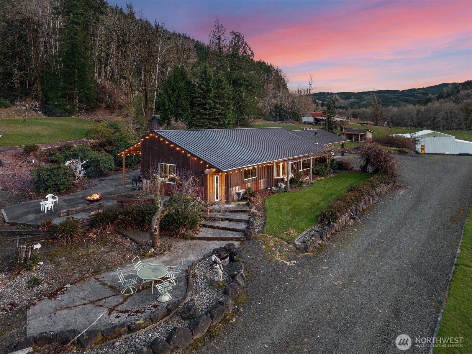 65 Wilderness Road Oakville, WA 98568 - Photo 5 of 40 a view of a town with barn house in the background