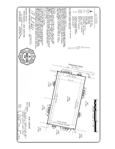 an aerial view of house with yard