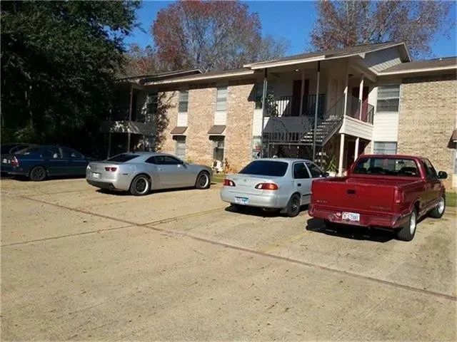 a car parked in front of a house