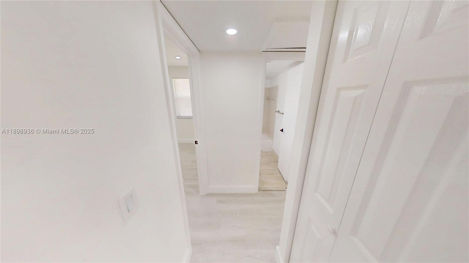 20230 Northeast 3rd Court, Unit 6 Miami, FL 33179 - Photo 37 of 44 a bathroom with a shower and a glass door